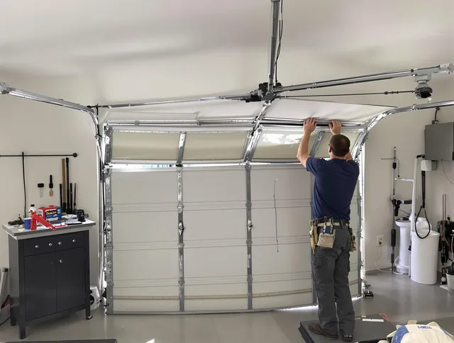 West Hollywood Garage Door Repair specialist performing precise section replacement on West Hollywood garage door
