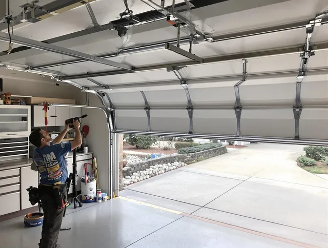 Garage door track repair service by West Hollywood Garage Door Repair in West Hollywood